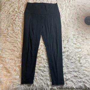 Aerie black leggings size M with cut out and bows at the ankle of legging